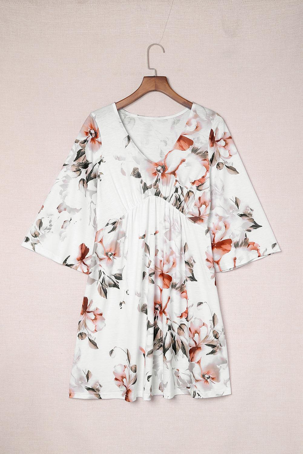 V-Hals Jurk met Bloemenprint en 3/4 Mouw - Floral Dresses - Jurkjes.co