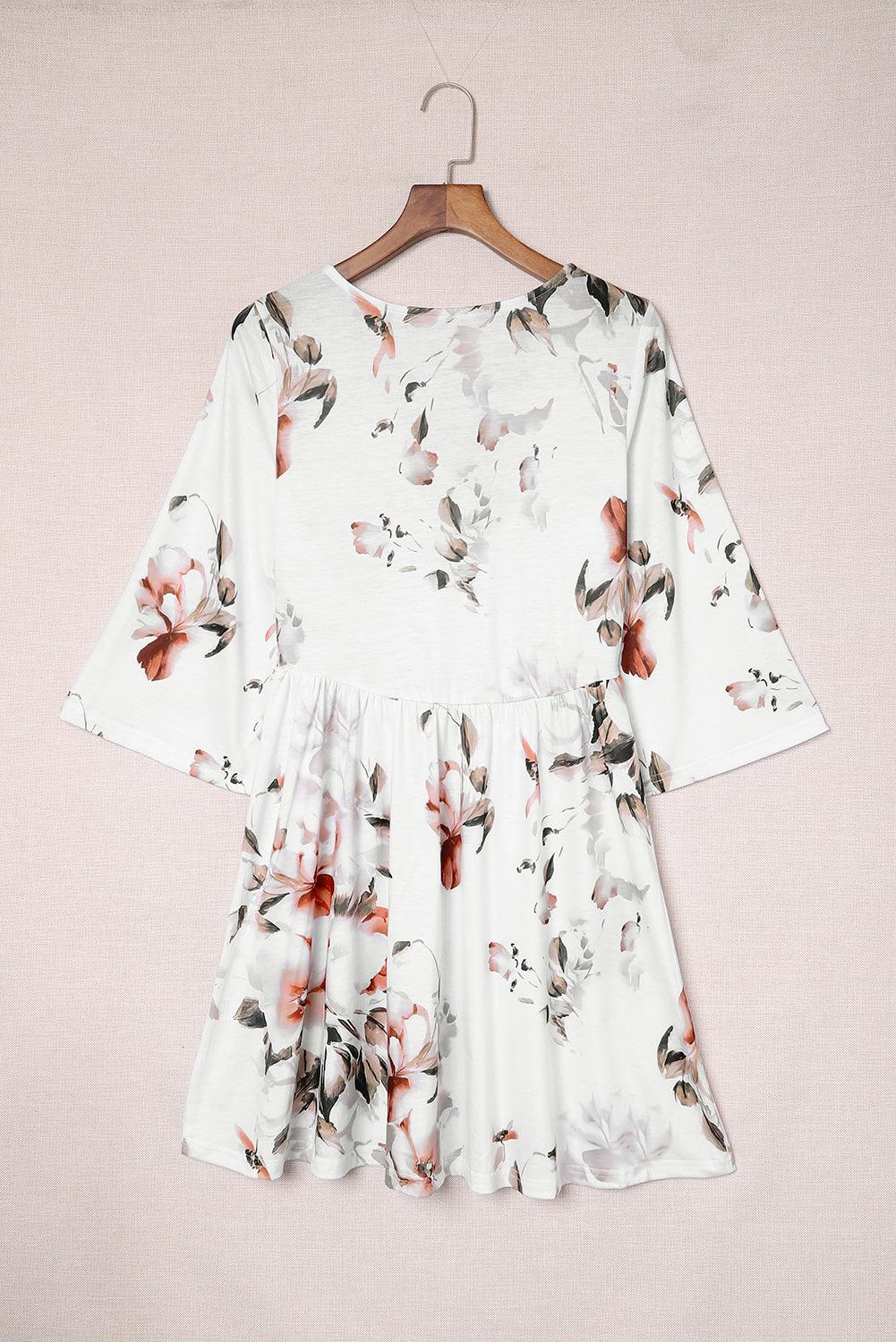 V-Hals Jurk met Bloemenprint en 3/4 Mouw - Floral Dresses - Jurkjes.co